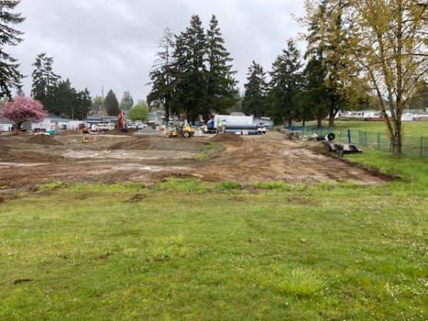 An empty field, about to be broken ground.